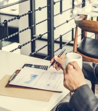 business man studying graph repo